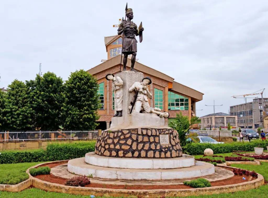 Benin City Bronze Art - Warrior Above Dead British Soldiers